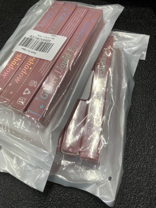 Photo 1 of ++2 PACK++YU KUI LX 4 Colors Shimmer Liquid Eyeshadow, Glitter Liquid Eyeshadow with Brush, Long Lasting Brightener Eyeshadow Makeup, Sparkle Eyeshadow Stick for Lip and Cheek (1234#)