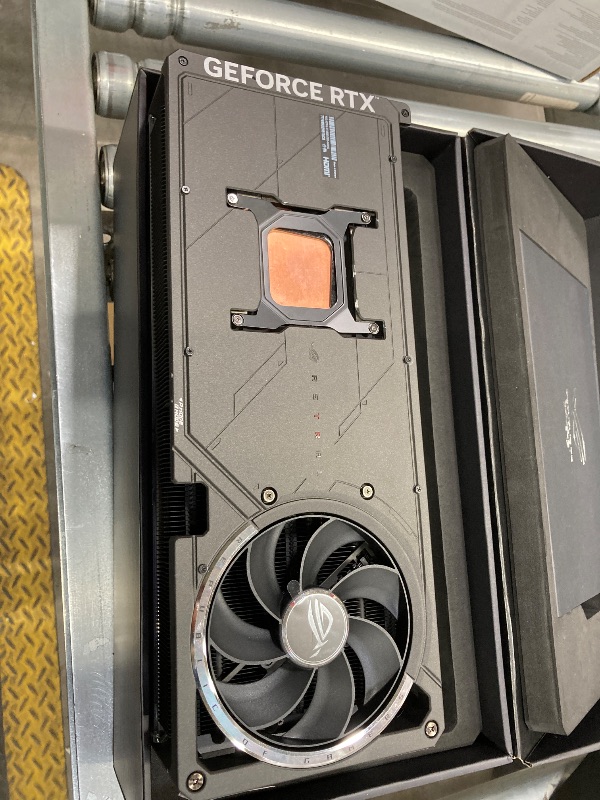 Photo 1 of ***Only to use to parts**ASUS ROG Astral GeForce RTX™ 5090 OC Edition Gaming Graphics Card (PCIe® 5.0, 32GB GDDR7, HDMI®/DP 2.1, 3.8-Slot, 4-Fan Design, Axial-tech Fans, Patented Vapor Chamber, Phase-Change GPU Thermal pad)