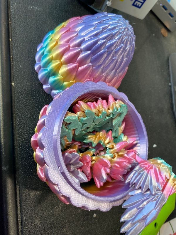 Photo 1 of *MINOR DAMAGE - USED*
3D Printed Dragon Eggs with Articulated Fly Dragon Inside, Collectible Figurines Fidget Toy for Adults Kids Birthday Easter Christmas White Elephant Gifts for Friends Colleagues(Rainbow, L size)