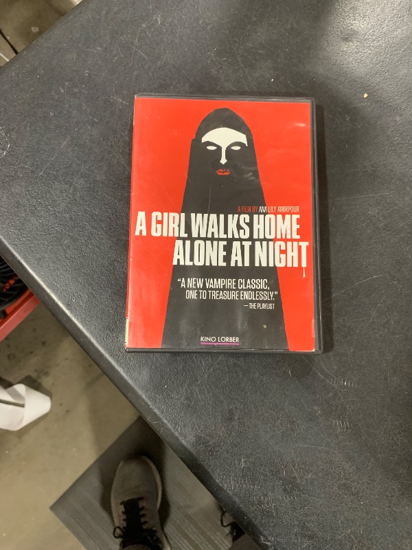 Photo 1 of A Girl Walks Home Alone at Night