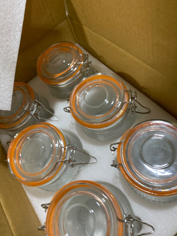 Photo 1 of 32 Oz Glass Mason Jars with Airtight Lids 6 Pack, Wide Mouth Canning Jars with Clip Top Lids for Kitchen Storage Pickling Salad Jams Coffee Beans