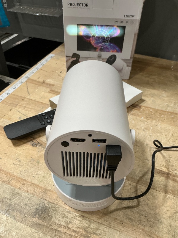 Photo 1 of [Electric Focus]Mini Portable Projector with 4K Support, Bluetooth 5.4 WIFI6, 5watt Sound Base Speaker, 260 ANSI, Android 11, 210° Rotation , Auto Keystone Correction Video Projector HY300 PLUS