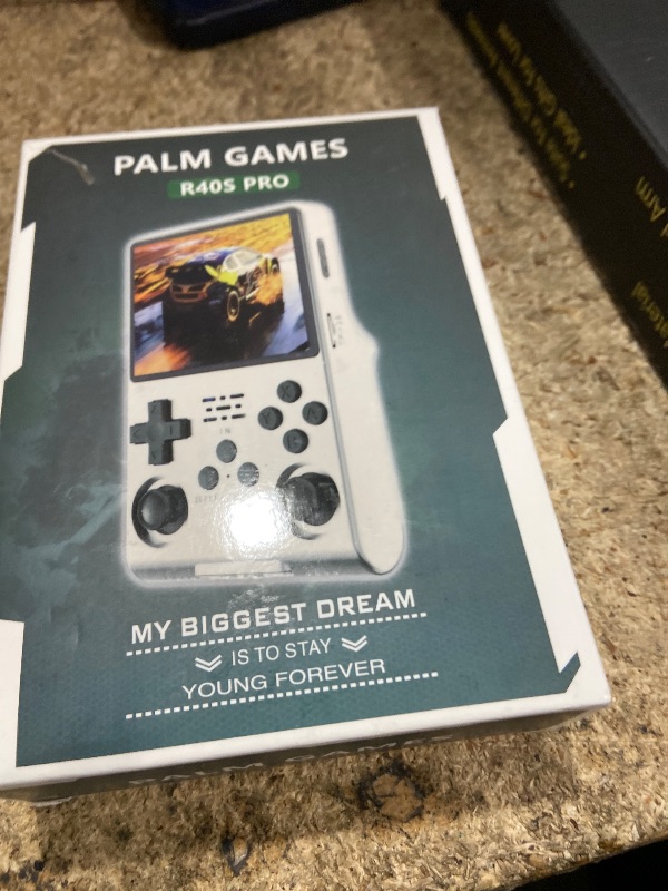 Photo 1 of ** FOR PARTS ONLY ** 
R40S PRO Retro Gaming Console, 30000+ HD Games Handheld Game Console, 3800mAh Rechargeable Mini Retro Video Console with 256GB TF Card, Portable Pocket Arcade (Transparent Purple)