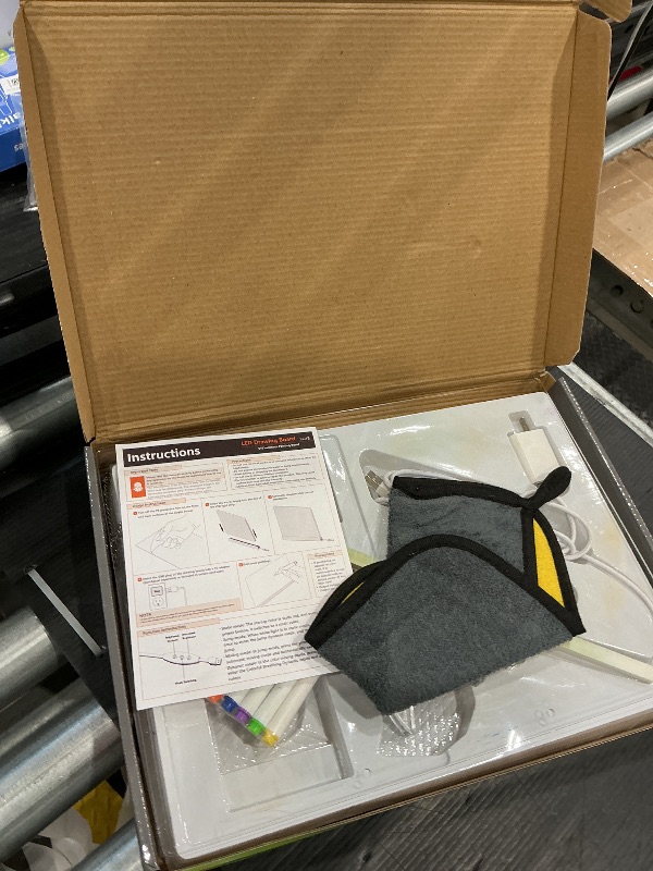 Photo 1 of ***MISSING ADAPTER*** Lumiboard Led Drawing Board with 7 Colors,14"X10" Acrylic Dry Erase Board with Light, Include Adapter, Hanging Chain, Led Drawing Board for Kids with Stand,Birthday and Christmas Gifts for Kids