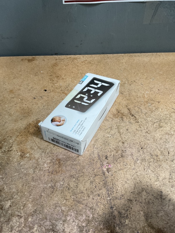 Photo 1 of ***CLOCK TURNS OFF AFTER 2 SECONDS TIRNS BACK ON WHEN TOUCHED*** Digital Alarm Clock 6.3 x2.7in LED Mirror Alarm Clock USB Electronic Digital Table Rechargeable for Bedroom, Bedside, Office(Black)