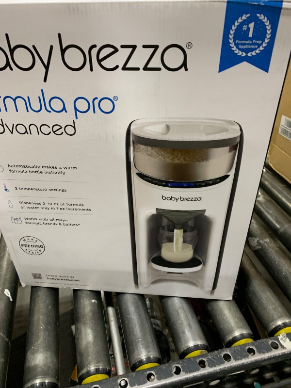 Photo 1 of Baby Brezza New and Improved Formula Pro Advanced Formula Dispenser Machine - Automatically Mix a Warm Formula Bottle Instantly - Easily Make Bottle with Automatic Powder Blending, White
