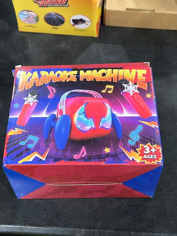 Photo 1 of Karaoke Machine for Kids, Red & Blue Glowing Eyes & Rhythm Light, 5 Magic Voice, 2 Wireless Mini Microphone, Portable Bluetooth Speaker, Easter Basket Stuffers Boys Gifts Age 3 4 5 6 7 8 9 10 11 12