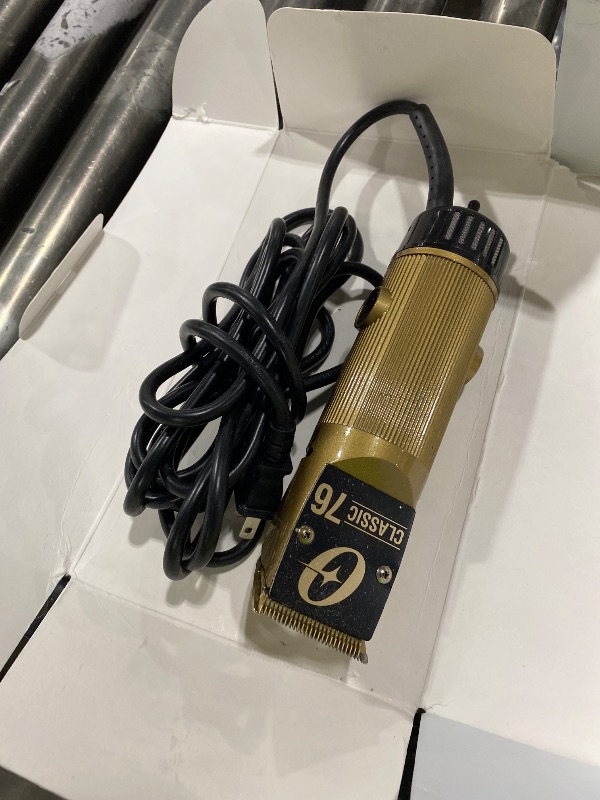 View 2 of Oster Professional Hair Clippers, Classic 76 for Barbers and Hair Cutting with Detachable Blade, Gold
