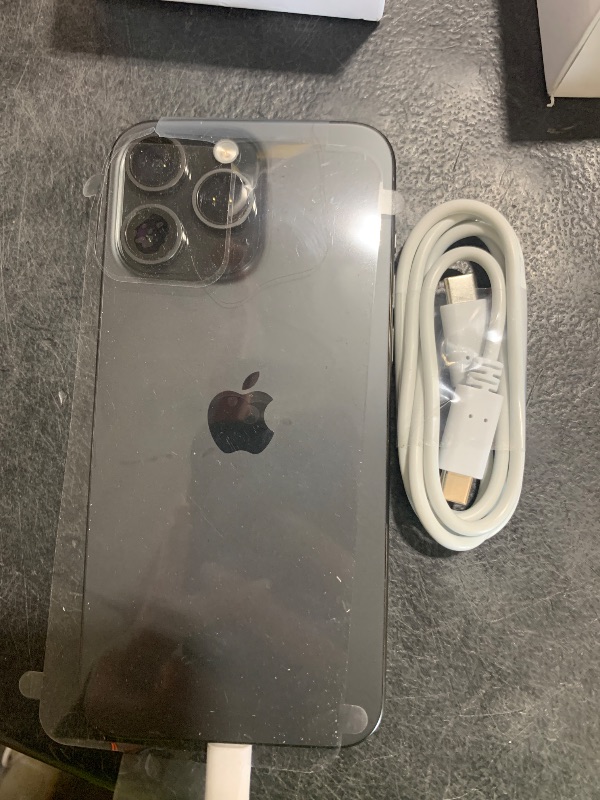 Photo 1 of Apple iPhone 15 Pro Max, 256GB, Black Titanium -has a password