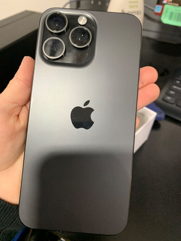Photo 1 of Apple iPhone 15 Pro Max, 256GB, Black Titanium -has a password