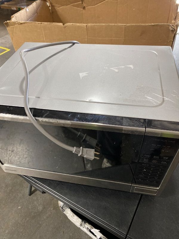 Photo 1 of *****VERY DAMAGED READ CLERK NOTES*****Panasonic Microwave Oven, Stainless Steel Countertop/Built-In Cyclonic Wave with Inverter Technology and Genius Sensor, 2.2 Cu. Ft, 1250W, NN-SN97JS (Silver)