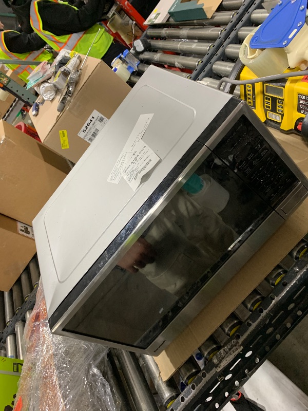Photo 1 of *****VERY DAMAGED READ CLERK NOTES*****Panasonic Microwave Oven, Stainless Steel Countertop/Built-In Cyclonic Wave with Inverter Technology and Genius Sensor, 2.2 Cu. Ft, 1250W, NN-SN97JS (Silver)
