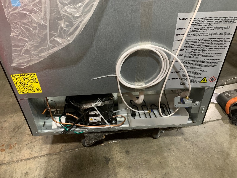 Photo 1 of Kenmore 33 in. 20.4 cu. ft Capacity Refrigerator/Freezer with Full-Width Adjustable Glass Shelving, Humidity Control Crispers, Ice Maker, ENERGY STAR Certified, Black