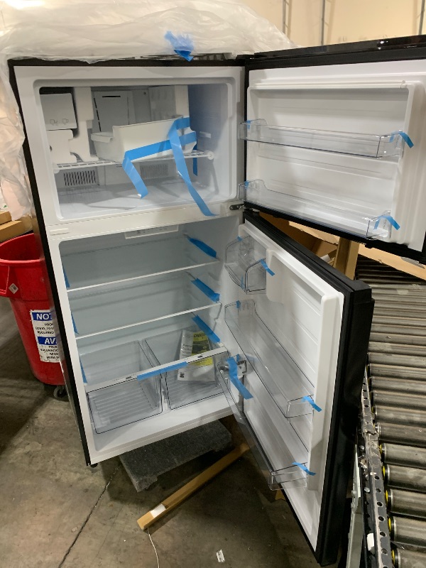 Photo 1 of Kenmore 33 in. 20.4 cu. ft Capacity Refrigerator/Freezer with Full-Width Adjustable Glass Shelving, Humidity Control Crispers, Ice Maker, ENERGY STAR Certified, Black