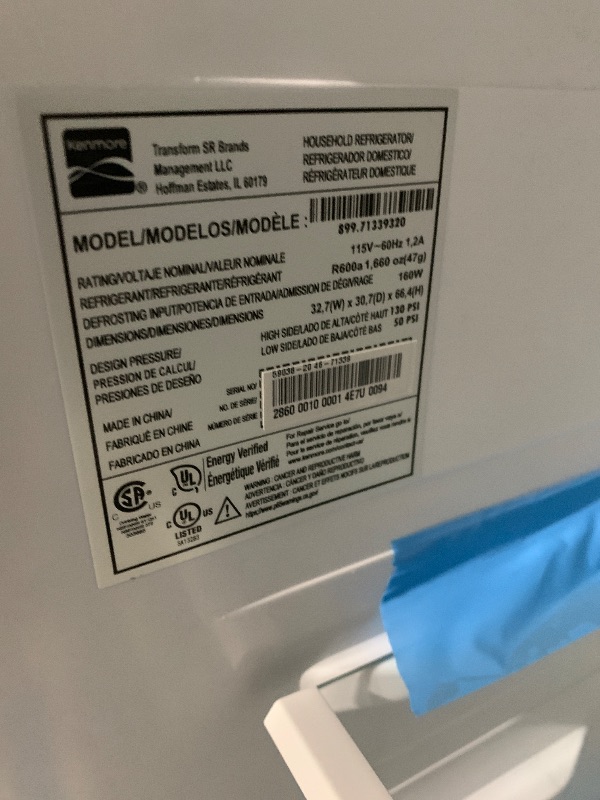 Photo 1 of Kenmore 33 in. 20.4 cu. ft Capacity Refrigerator/Freezer with Full-Width Adjustable Glass Shelving, Humidity Control Crispers, Ice Maker, ENERGY STAR Certified, Black