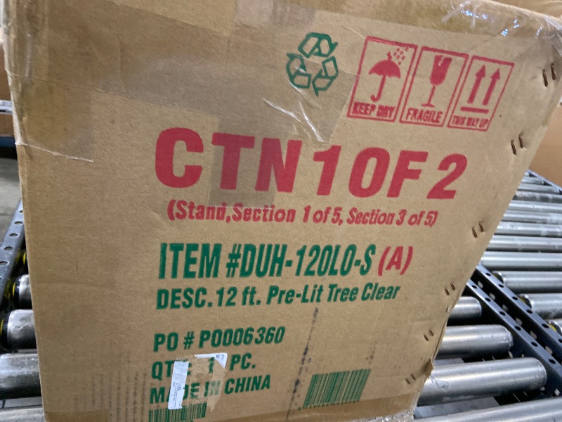 Photo 1 of National Tree Company 12 ft Pre-Lit Dunhill Fir Artificial Christmas Tree, 1,500 Clear Lights, 7,794 Tips, Includes Stand, Green