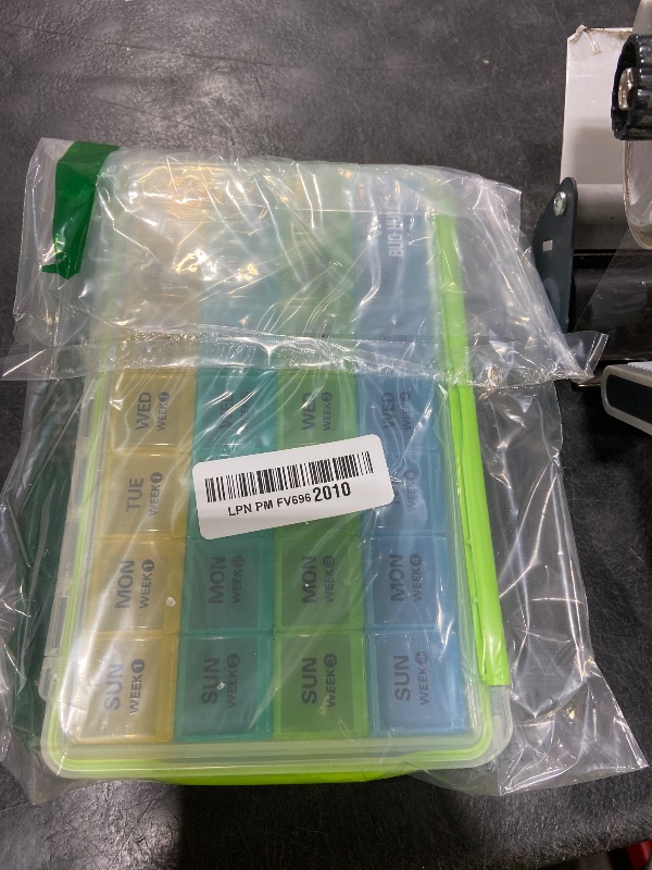 Photo 1 of BUG HULL Monthly Pill Organizer, Moisture-Proof Large 28 Days Pill Box with Removable 4 Weeks Pill Case Rows, Medicine Pill Organizer, Travel Pills Organizer with One Month Pill Container for Vitamin