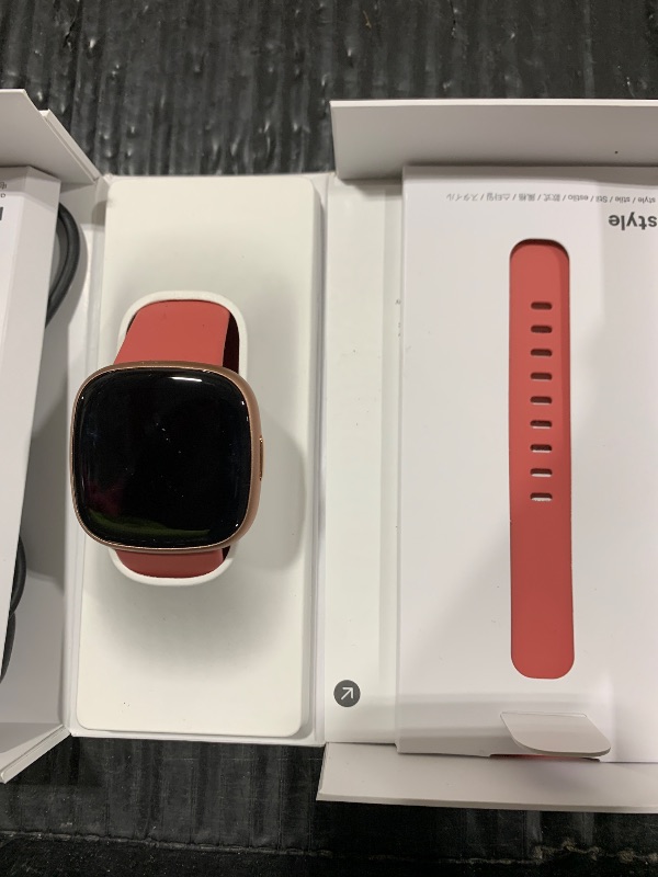 Photo 1 of SCREEN WONT POWER ON*** Fitbit Versa 4 Fitness Smartwatch with Daily Readiness, GPS, 24/7 Heart Rate, 40+ Exercise Modes, Sleep Tracking and more, Pink Sand/Copper Rose, One Size (S & L Bands Included)