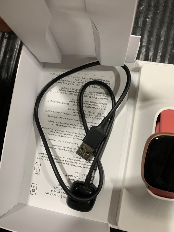 Photo 1 of SCREEN WONT POWER ON*** Fitbit Versa 4 Fitness Smartwatch with Daily Readiness, GPS, 24/7 Heart Rate, 40+ Exercise Modes, Sleep Tracking and more, Pink Sand/Copper Rose, One Size (S & L Bands Included)