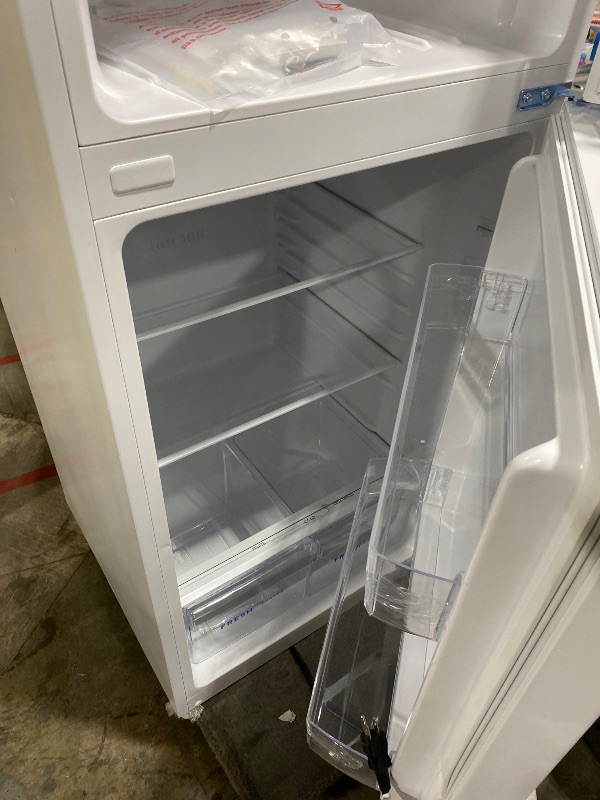 Photo 1 of Frigidaire 10.1 Cu. Ft. Compact ADA Top Freezer Refrigerator in White with Electronic Control Panel, Reversible Door Swing, ENERGY STAR