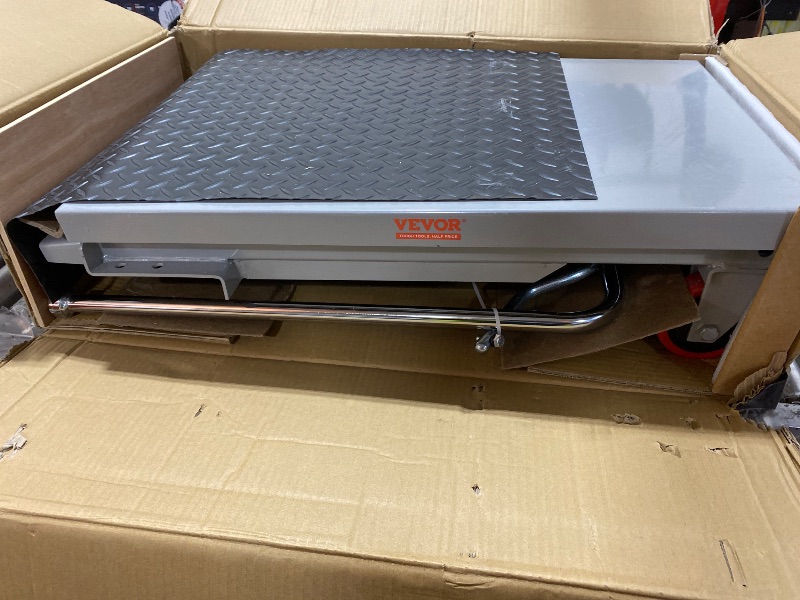 Photo 1 of VEVOR Hydraulic Lift Table Cart, 500lbs Load Capacity 28.5 Inch Lifting Height, Manual Single Scissor Lift Table with 4 Wheels and Non-Slip Pad, Hydraulic Scissor Cart for Material Handling, Gray