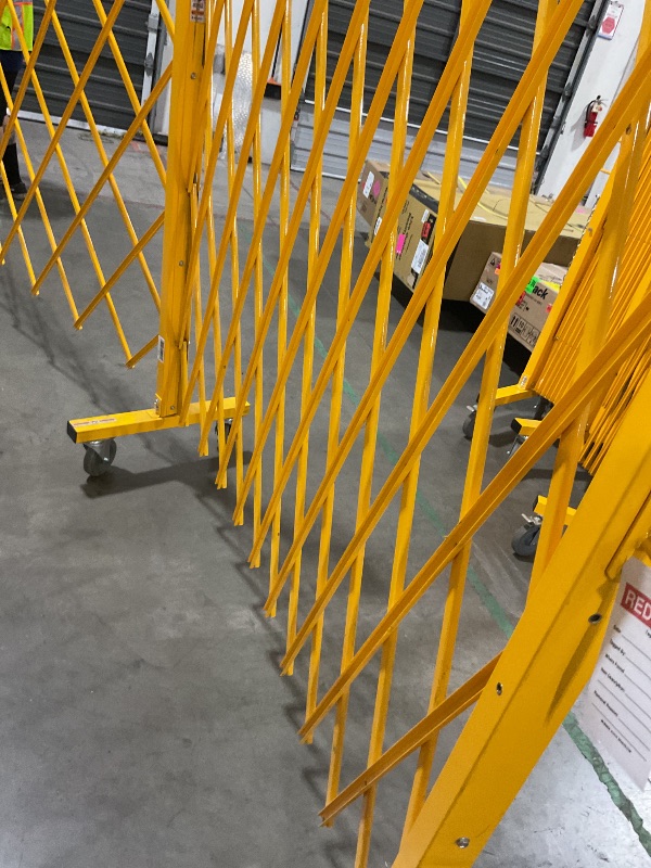 Photo 1 of Global Industrial™ Folding Safety Barricade Gate with Sign, 20' Expanded Length