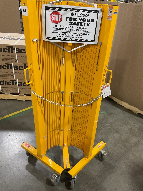 Photo 1 of Global Industrial™ Folding Safety Barricade Gate with Sign, 20' Expanded Length