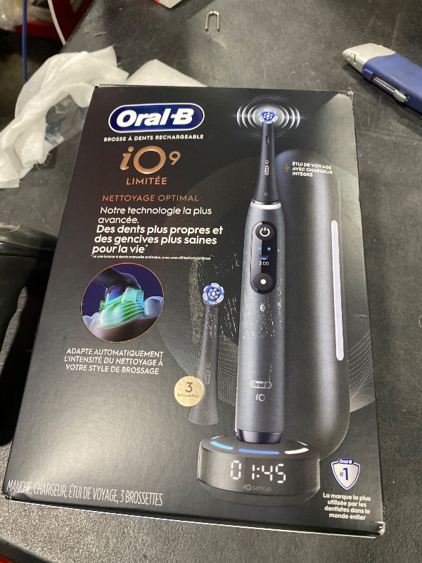 Photo 1 of Oral-B iO Series 9 Limited Rechargeable Black Electric Toothbrush with (2) Ultimate Clean and (1) Gentle Care Replacement Brush Heads, Black, Travel Case and Charger