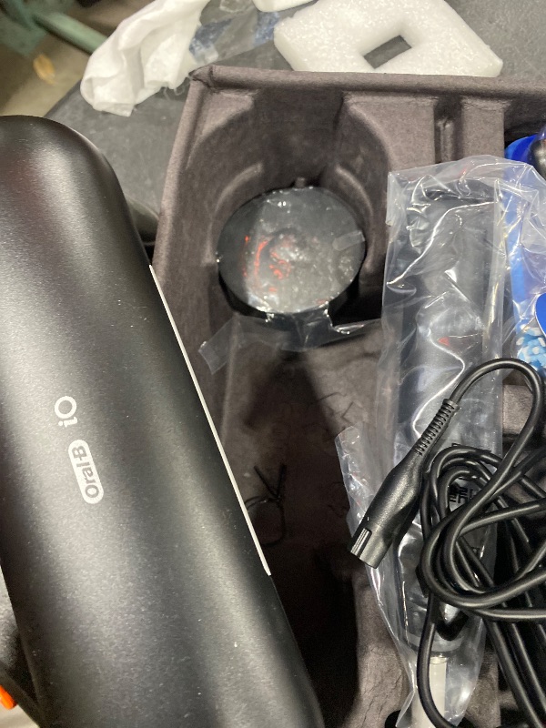 Photo 1 of Oral-B iO Series 9 Limited Rechargeable Black Electric Toothbrush with (2) Ultimate Clean and (1) Gentle Care Replacement Brush Heads, Black, Travel Case and Charger