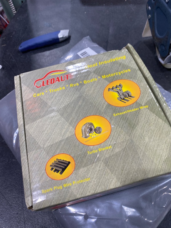 Photo 1 of LEDAUT 2" x 50' Titanium Exhaust Heat Wrap Roll for Motorcycle Fiberglass Heat Shield Tape with Stainless Ties