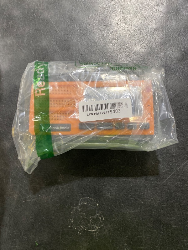 Photo 1 of 10000mAh Emergency Hand Crank Radio, AM/FM/NOAA Weather Alert, Solar Powered, 4 Charging Methods, 3-Mode Flashlight, Reading Lamp, SOS Alarm, Phone Charger, Orange