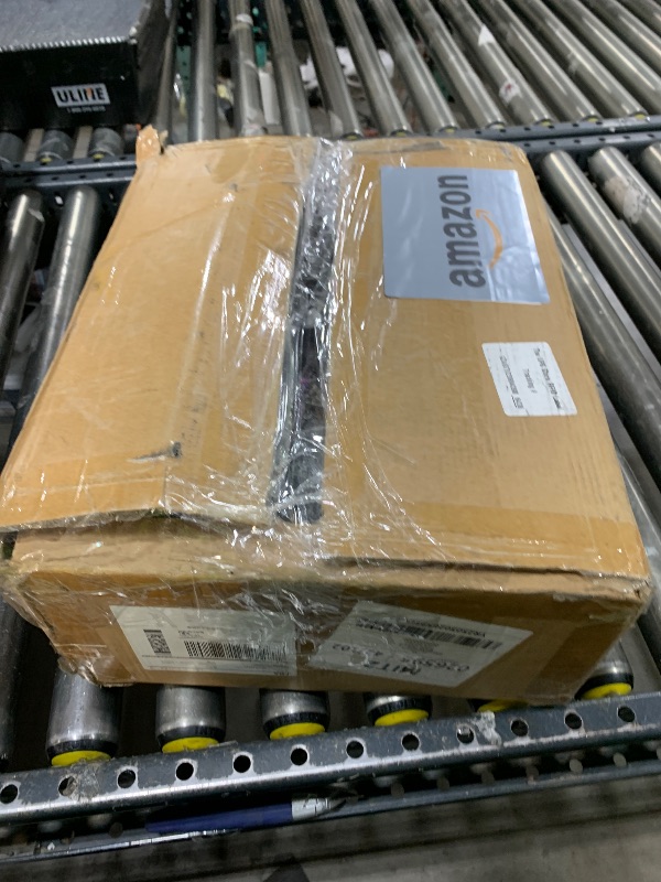 Photo 1 of Compact Coffee Bar Cabinet with Power Outlet, Lockable Wheels, and Storage Drawer - Rustic Brown & Black for Office, Living Room, or Small Spaces
