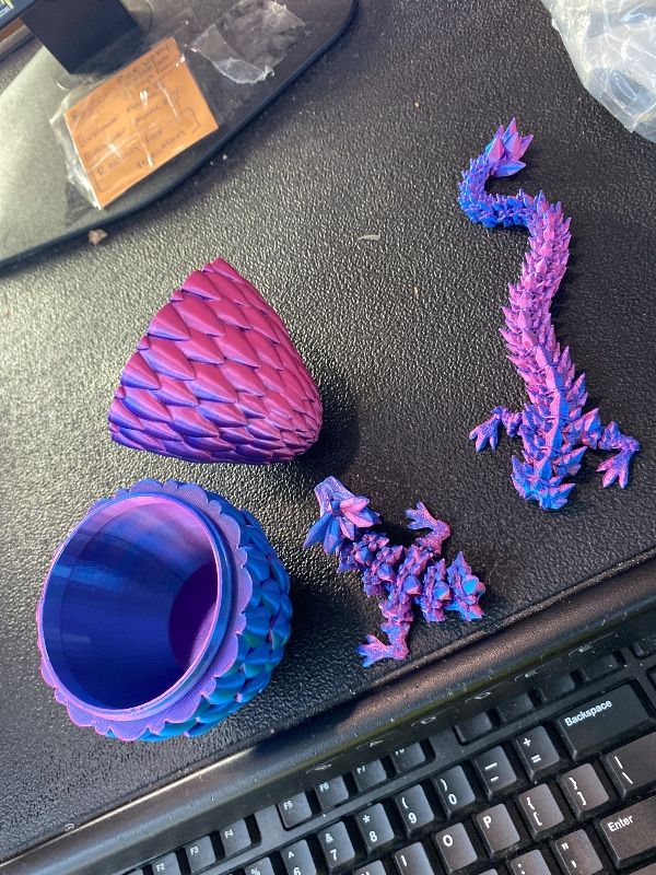 View 3 of ***MAJOR DAMAGE*** Qxbuhe 12inch 3D Printed Dragon Egg,Mystery Crystal Dragon Fidget Toys,Articulated Dragon,Home Desk Decor Easter Surprise Dinosaur Eggs,Adults Fidget Toys for Autism/ADHD (Laser Purple)