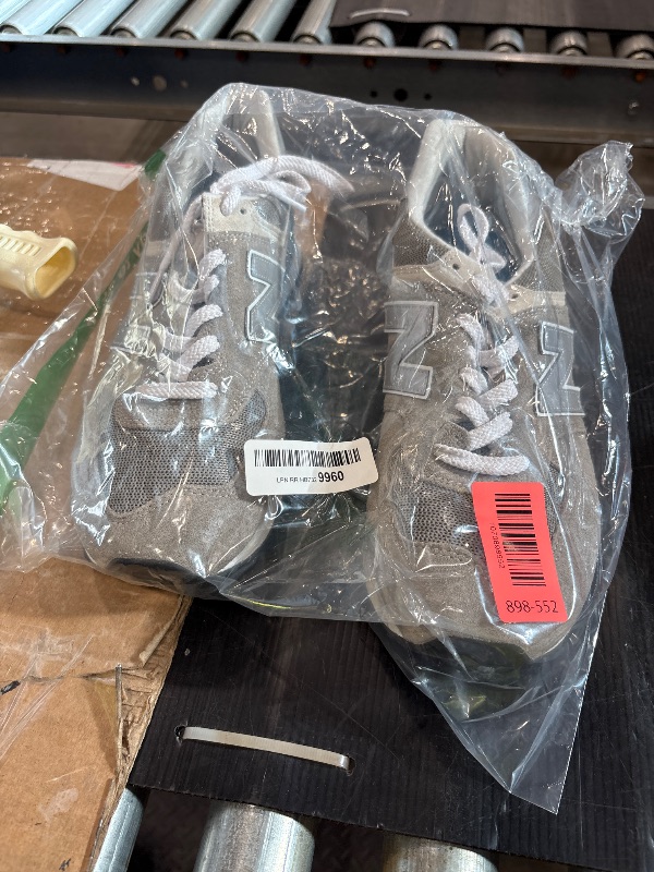 Photo 1 of *MINOR DAMAGE - USED*
New Balance Men's 574 Core Sneaker, Grey/White, 11