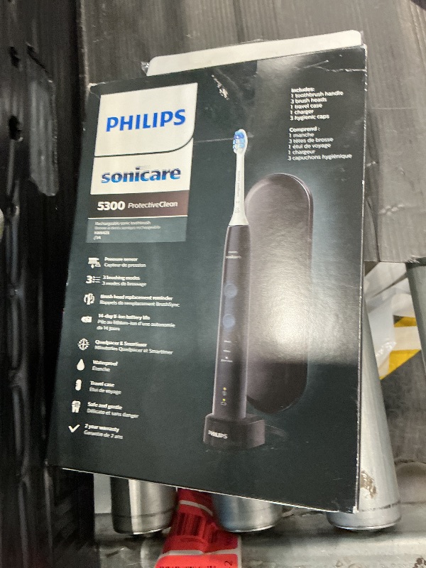 Photo 1 of *MINOR DAMAGE - USED*
Philips Sonicare ProtectiveClean 5300 Rechargeable Electric Toothbrush, with Pressure Sensor, 3 Cleaning Modes, SmarTimer and QuadPacer, with 2 Bonus Brush Heads, Travel Case, Black, Model HX6423/34