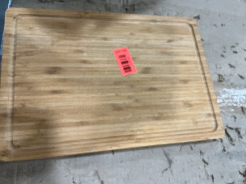 Photo 1 of *MINOR DAMAGE - USED*
Bamboo Wood Cutting Board for Kitchen, 1" Thick Butcher Block, Cheese Charcuterie Board, with Side Handles and Juice Grooves, 16x11"