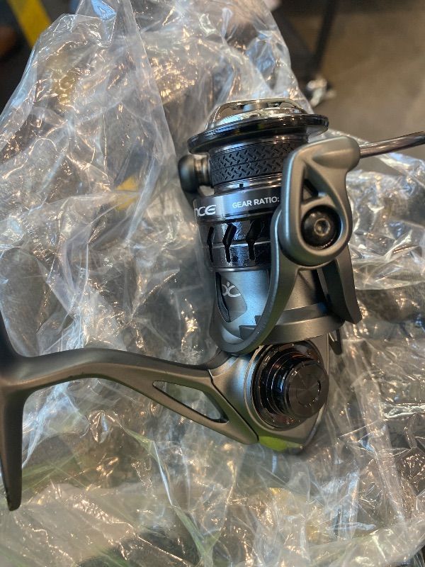 Photo 1 of *MINOR DAMAGE - USED*
Cadence Vigor Spinning Reel - 9+1 BB Fishing Reel with Lightweight Magnesium Frame, Smooth Powerful Spinning Reels with High-Speed 6.2:1 Gear Ratio, 36 LBs Max Drag & Stronger Machined Handle (1000)