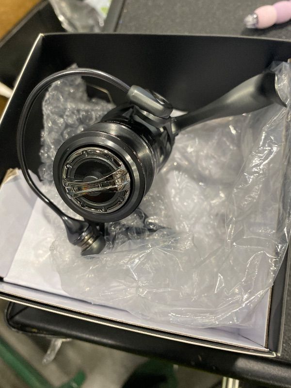 Photo 1 of *MINOR DAMAGE - USED*
Cadence Vigor Spinning Reel - 9+1 BB Fishing Reel with Lightweight Magnesium Frame, Smooth Powerful Spinning Reels with High-Speed 6.2:1 Gear Ratio, 36 LBs Max Drag & Stronger Machined Handle (1000)