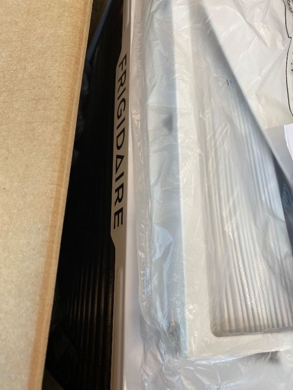 Photo 1 of **MAJOR DAMAGE**
Frigidaire 10,000 BTU Window Air Conditioner & Dehumidifier, 115V, Cools up to 450 Sq. Ft. for Apartment, Dorm Room & Small/Medium Rooms, with Remote Control, Programmable Timer, and Sleep Mode, White