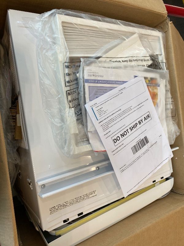 Photo 1 of **MAJOR DAMAGE**
Frigidaire 10,000 BTU Window Air Conditioner & Dehumidifier, 115V, Cools up to 450 Sq. Ft. for Apartment, Dorm Room & Small/Medium Rooms, with Remote Control, Programmable Timer, and Sleep Mode, White
