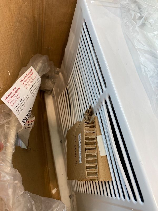 Photo 1 of **MAJOR DAMAGE**
Frigidaire 10,000 BTU Window Air Conditioner & Dehumidifier, 115V, Cools up to 450 Sq. Ft. for Apartment, Dorm Room & Small/Medium Rooms, with Remote Control, Programmable Timer, and Sleep Mode, White