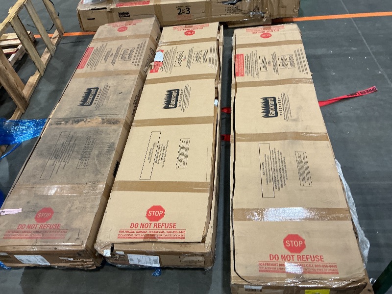 Photo 1 of Backyard Discovery Endeavor II Cedar Wood Swing Set with Wave Slide, Play Deck, Double Rock Wall, Picnic Table, Climbing Wall, Belt Swings, Web Swing, Toy Telescope, Step Ladder, Outdoor Playset