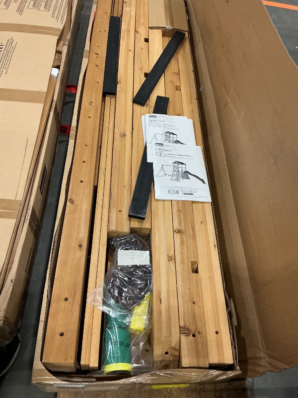 Photo 1 of Backyard Discovery Endeavor II Cedar Wood Swing Set with Wave Slide, Play Deck, Double Rock Wall, Picnic Table, Climbing Wall, Belt Swings, Web Swing, Toy Telescope, Step Ladder, Outdoor Playset