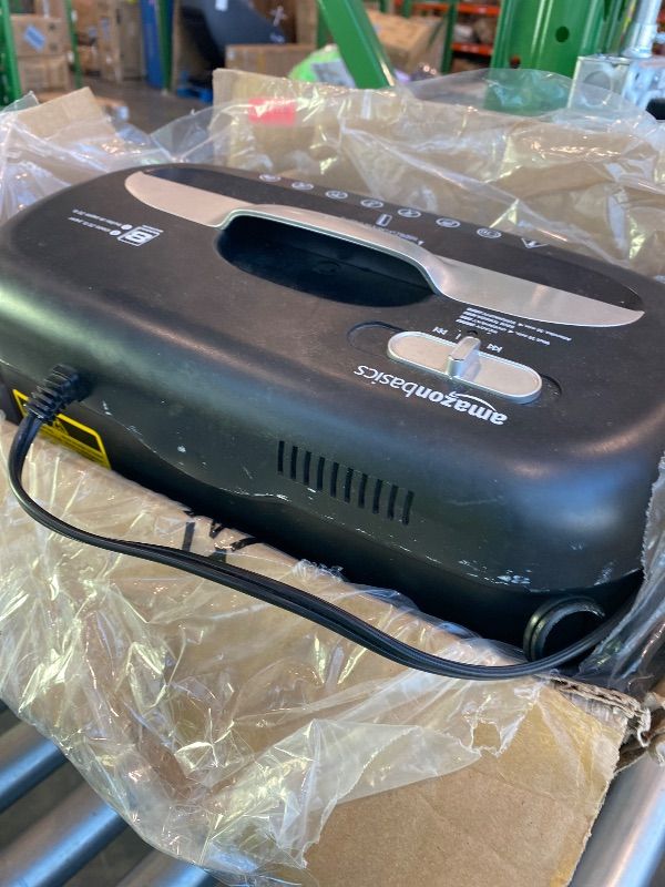 Photo 1 of ***VERY USED*** Amazon Basics 8-Sheet Cross Cut Paper Shredder and Credit Card Shredder - Black