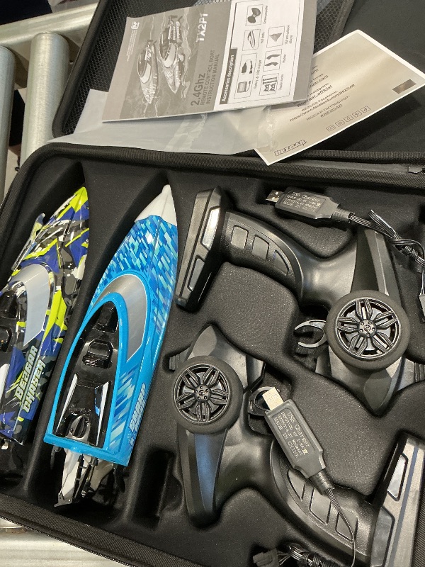 Photo 1 of ***MINOR DAMAGE*** ***READ CLERK NOTES*** BEZGAR RC Boat, 2 Packs 12 inch Fast Speed RC Boat 30 KPH with A Portable Suitcase for Lakes & Pools & Salt Water, Summer Toys for Adults and Ideal Gifts for Kids Boys Age 6 7 8-12 Years Old - TX2P1