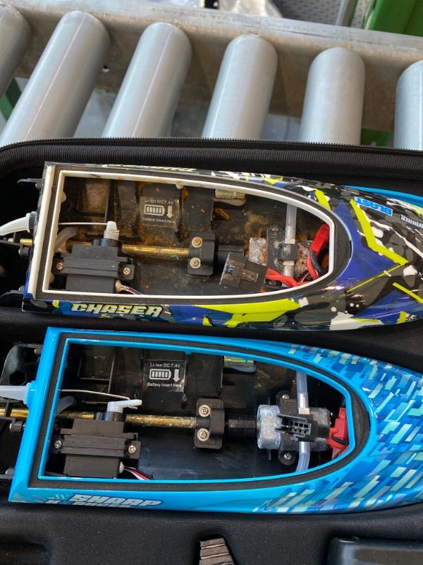 Photo 1 of ***MINOR DAMAGE*** ***READ CLERK NOTES*** BEZGAR RC Boat, 2 Packs 12 inch Fast Speed RC Boat 30 KPH with A Portable Suitcase for Lakes & Pools & Salt Water, Summer Toys for Adults and Ideal Gifts for Kids Boys Age 6 7 8-12 Years Old - TX2P1
