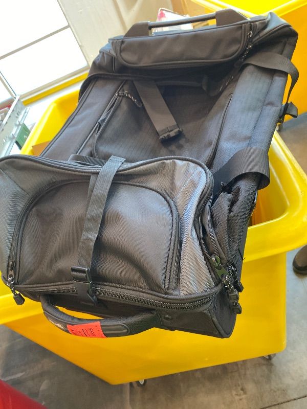 Photo 1 of *MAJOR DAMAGE*
Amazon Basics 30-Inch Large Rolling Duffel Bag with Wheels and Handle, Durable Ripstop Polyester, 2 Layers of Space, Multiple Interior and Exterior Pockets, Black