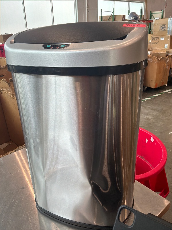 Photo 1 of [Dented but does close, missing power cord] iTouchless 13 Gallon Oval Touchless Sensor Trash Can with Odor Filter, Fingerprint-Proof Stainless Steel, 50L Automatic Kitchen Garbage Bin, Smart Hands-Free Motion Lid, Quiet Soft-Close