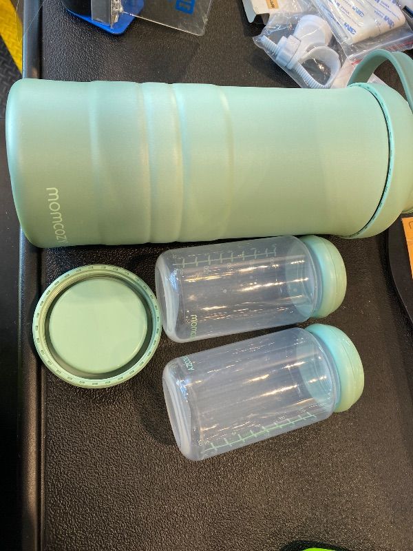 Photo 1 of *MINOR DAMAGE - USED*
Momcozy 22oz Portable Breast Milk Cooler for Outdoor, Life Saver with 360° Total Cooling for 24 Hours, Larger Capacity Travel Breastmilk Chiller with 2pcs Baby Bottles for Breastmilk Storage, Green
