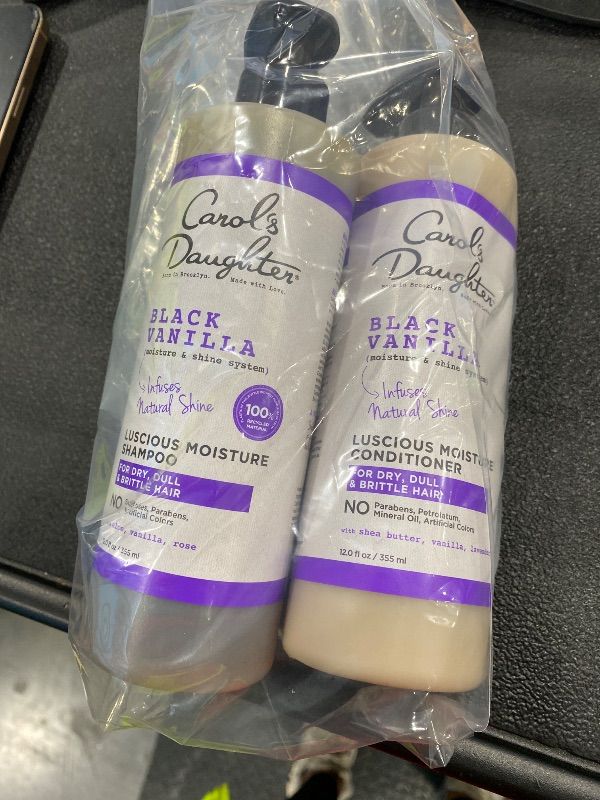 Photo 1 of *MINOR DAMAGE*
Carol's Daughter Black Vanilla Sulfate Free Shampoo and Conditioner Set for Curly, Wavy or Natural Hair, Moisturizing Hair Care for Dry, Damaged Split Ends, 1 Kit